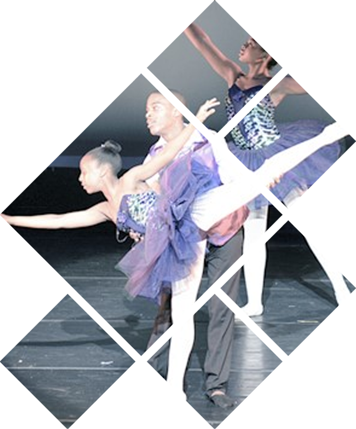 Three dancers performing on stage.